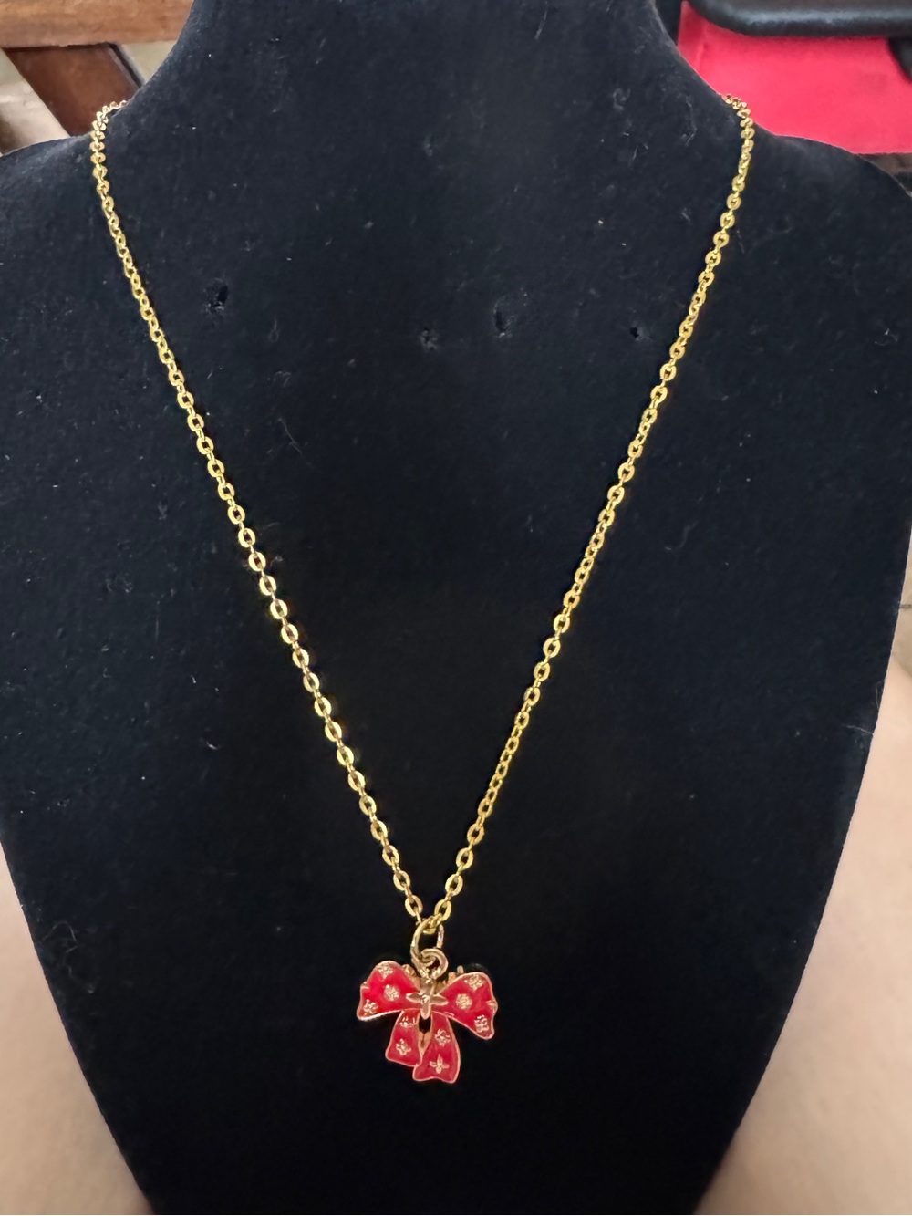 Louis Vuitton Red Bow Charm Pendant with Gold Accents